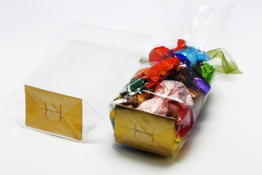 Clear poly bag with gold card - Medium.